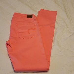 American Eagle Neon Pink Skinny Frayed Jeans